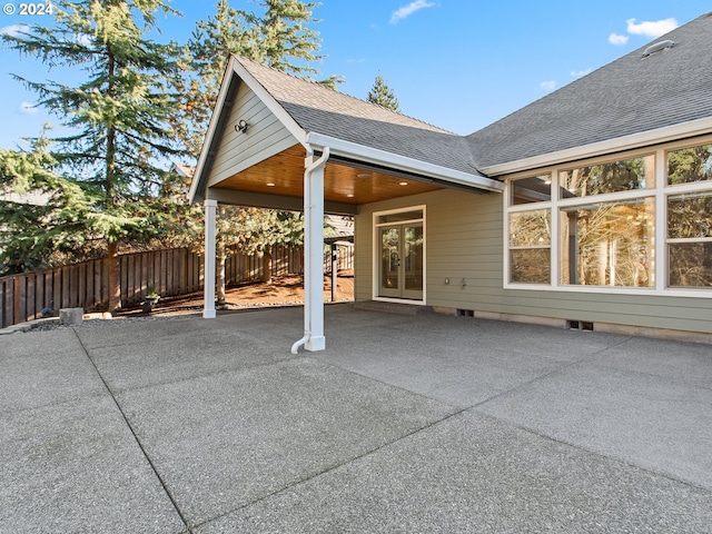 view of patio featuring fence