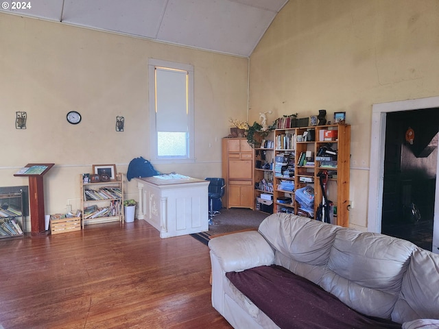 interior space with lofted ceiling and wood finished floors