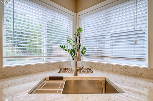 300 Spinnaker Way, Columbia City, OR 97018 - kitchen view of light stone counters and a sink