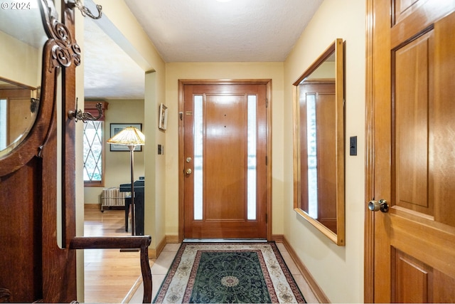 8805 NE 36th St, Vancouver, WA 98662 - doorway to outside with light tile patterned flooring and baseboards