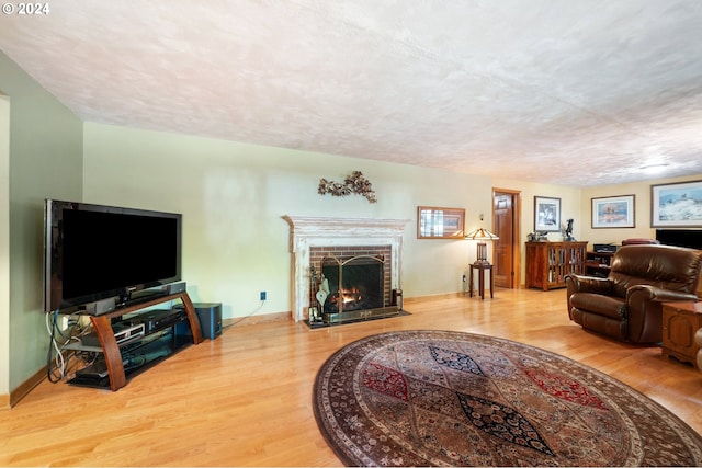 8805 NE 36th St, Vancouver, WA 98662 - living room with a fireplace, a textured ceiling, and wood finished floors