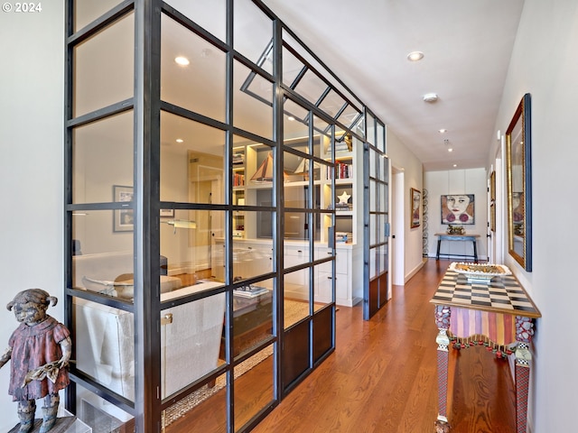 corridor featuring french doors and hardwood / wood-style floors