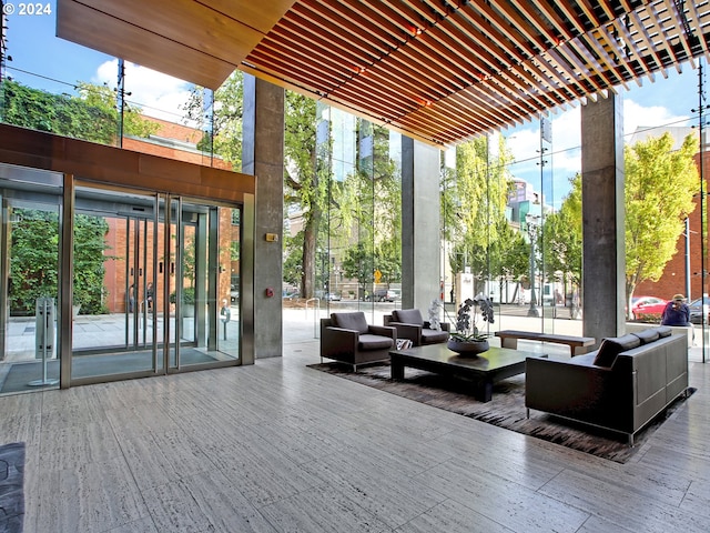 1221 SW 10th Ave Unit 1704, Portland, OR 97205 - building lobby with a high ceiling and floor to ceiling windows