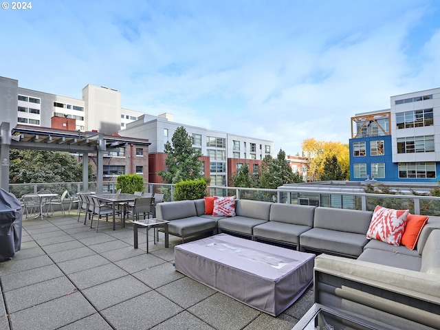 view of patio / terrace with an outdoor living space, grilling area, and a pergola