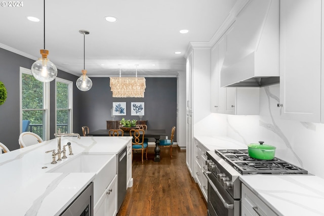 kitchen with stainless steel appliances, light stone counters, white cabinets, decorative light fixtures, and custom exhaust hood