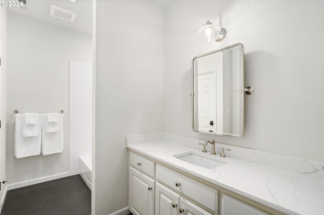 bathroom featuring vanity and shower / bathtub combination