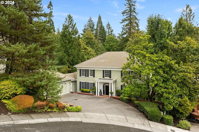 view of front of property with a garage