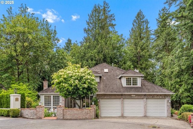 1739 Palisades Terrace Dr, Lake Oswego, OR 97034 - view of front of property with a garage, a chimney, and brick siding