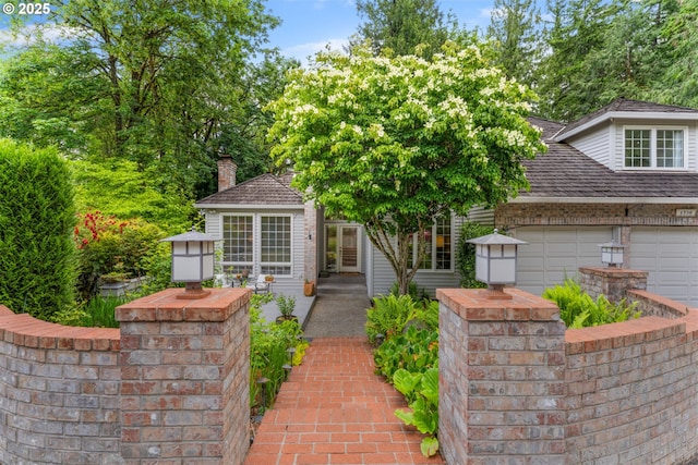 1739 Palisades Terrace Dr, Lake Oswego, OR 97034 - view of front of property featuring a garage and a chimney