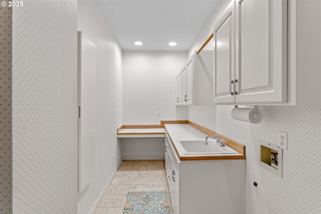 1739 Palisades Terrace Dr, Lake Oswego, OR 97034 - washroom with cabinet space, baseboards, hookup for a washing machine, stone tile flooring, and recessed lighting