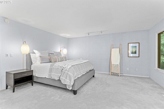 1739 Palisades Terrace Dr, Lake Oswego, OR 97034 - bedroom with carpet floors, baseboards, and rail lighting