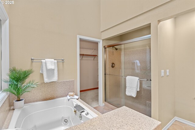 1739 Palisades Terrace Dr, Lake Oswego, OR 97034 - bathroom featuring a stall shower, a jetted tub, and a spacious closet