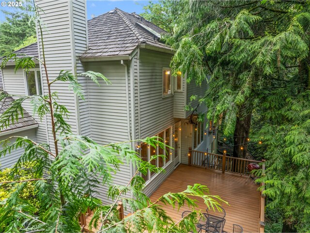 1739 Palisades Terrace Dr, Lake Oswego, OR 97034 - view of property exterior with a deck and a chimney