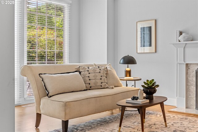 1739 Palisades Terrace Dr, Lake Oswego, OR 97034 - sitting room with a high end fireplace and wood finished floors