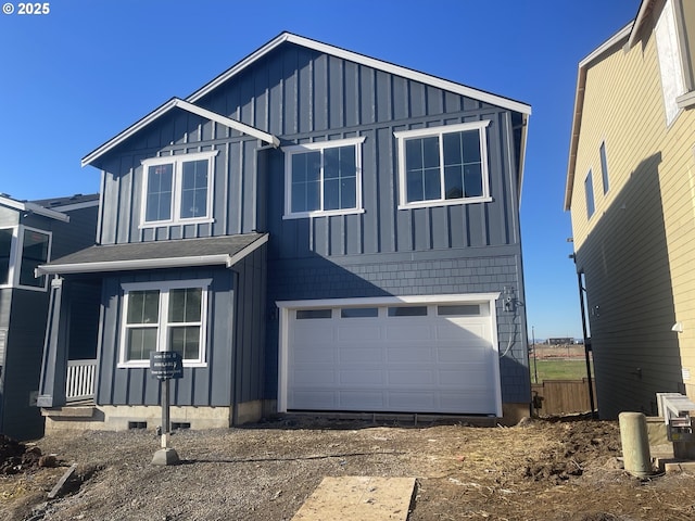 view of front of home featuring a garage