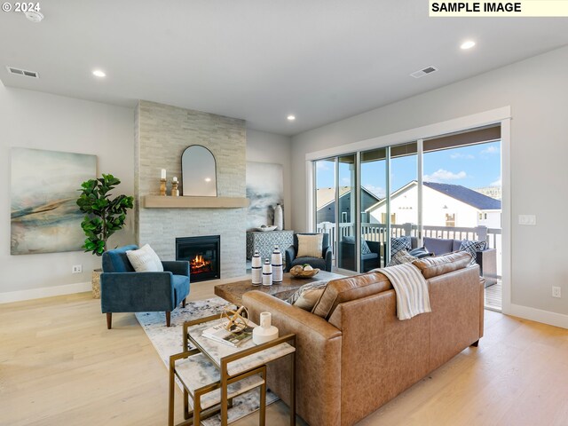 living room featuring a fireplace