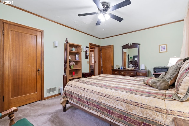 bedroom featuring light carpet, ceiling fan, and crown molding