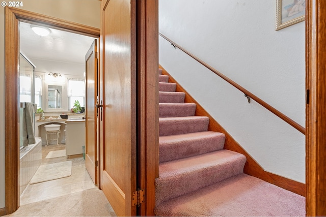 stairs featuring tile patterned flooring