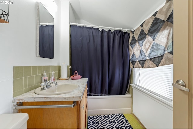 full bathroom with shower / tub combo, decorative backsplash, vanity, tile patterned flooring, and toilet