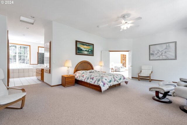 bedroom featuring ceiling fan and light carpet