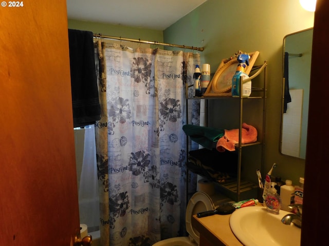 bathroom with vanity and toilet