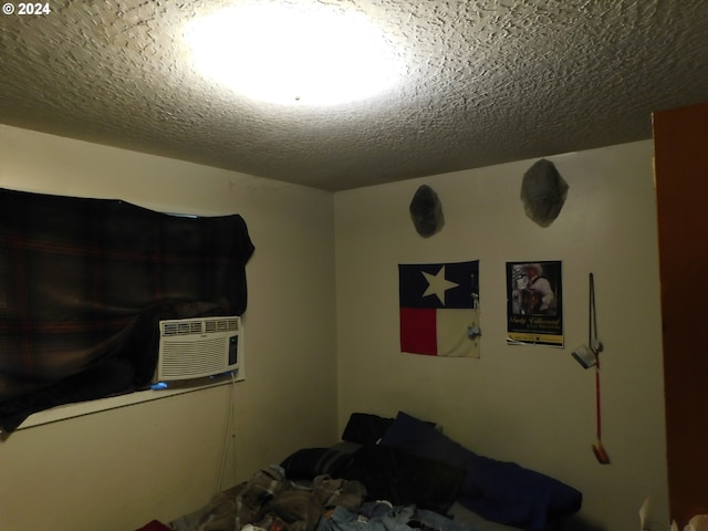 bedroom with a textured ceiling