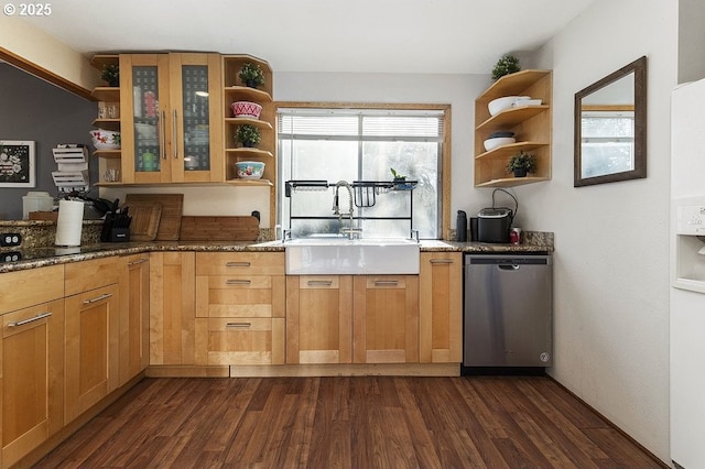 kitchen with light stone countertops, stainless steel dishwasher, dark wood-type flooring, and sink