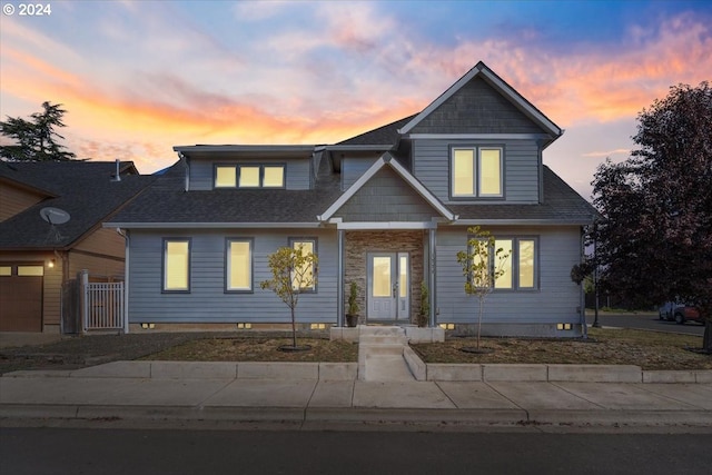 view of front of property featuring a garage