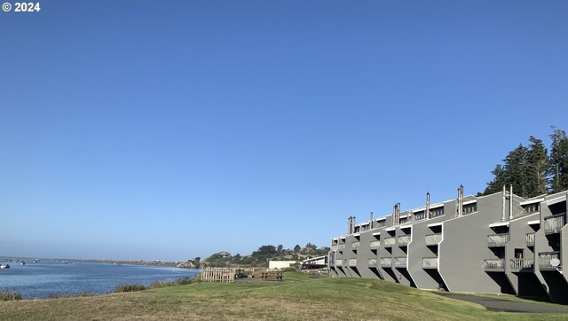 view of property featuring a water view