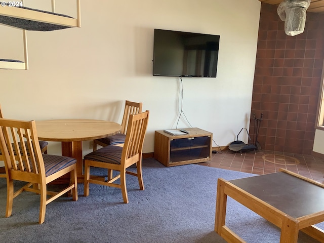 view of carpeted dining area