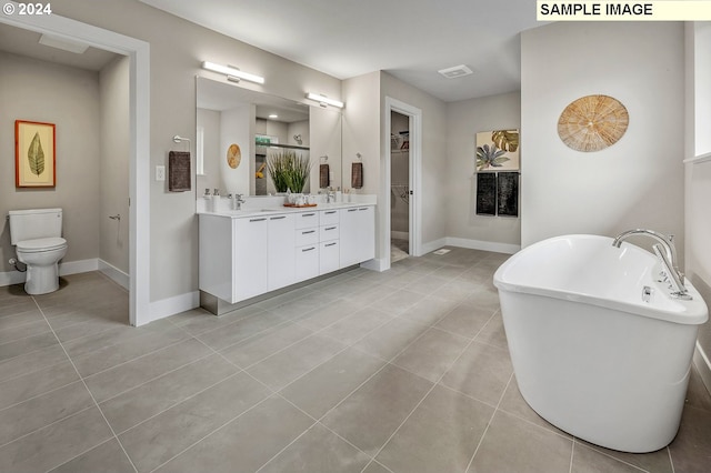 full bathroom featuring toilet, vanity, tile patterned floors, and plus walk in shower