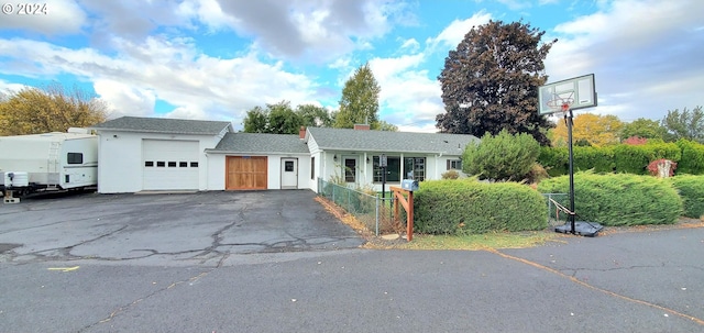 single story home with a garage