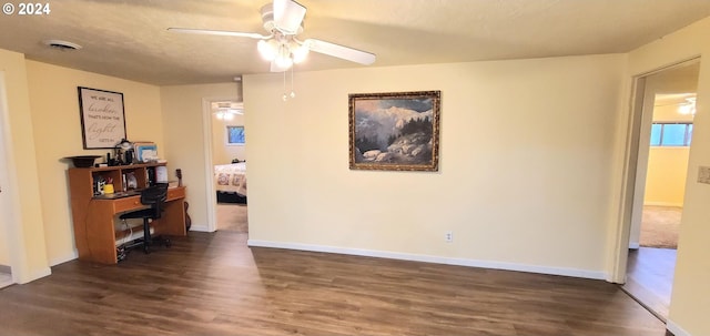 hall with dark hardwood / wood-style floors