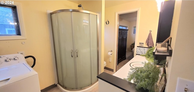 interior space with washer / clothes dryer and sink