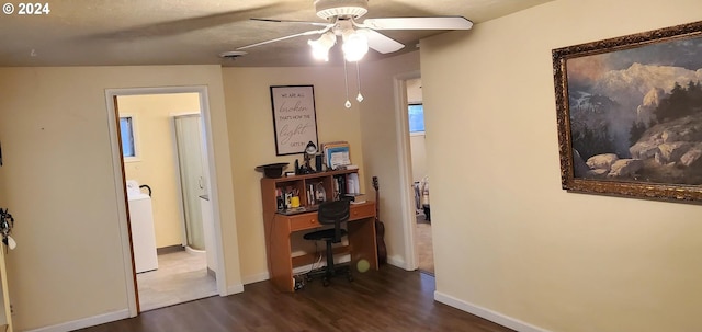 hallway with washer / clothes dryer and dark hardwood / wood-style floors