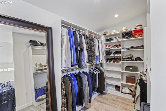 spacious closet featuring light wood-type flooring