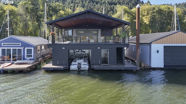 dock area with a deck with water view