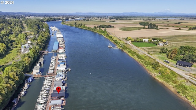 bird's eye view featuring a water and mountain view