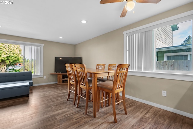 dining area with ceiling fan and wood-type flooring