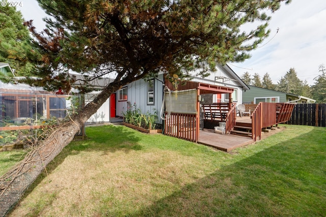 view of yard featuring a deck