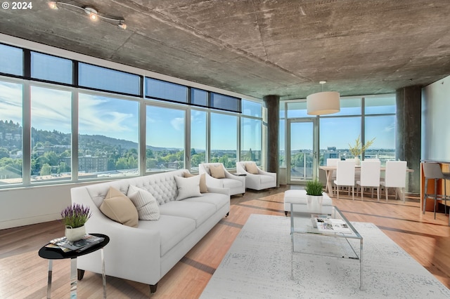 sunroom / solarium with a mountain view