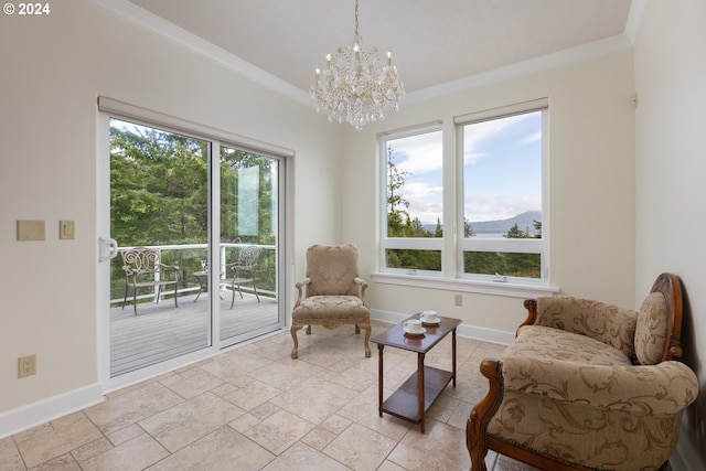 sitting room with an inviting chandelier, light tile patterned flooring, and ornamental molding