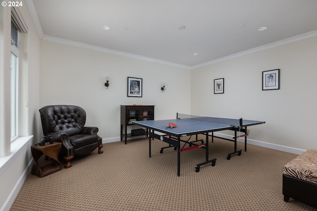 game room featuring carpet floors and ornamental molding