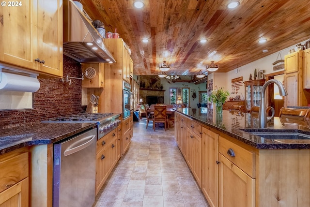 kitchen with appliances with stainless steel finishes, wall chimney exhaust hood, light tile floors, backsplash, and wood ceiling