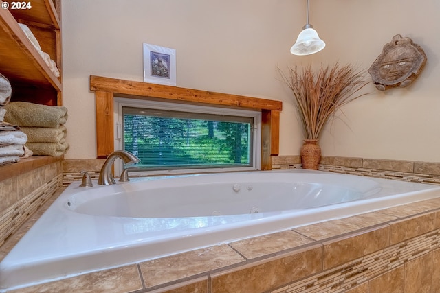 bathroom featuring tiled tub