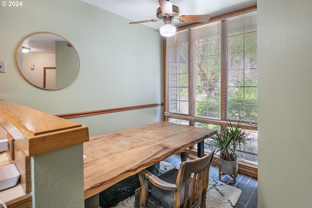 dining space with ceiling fan