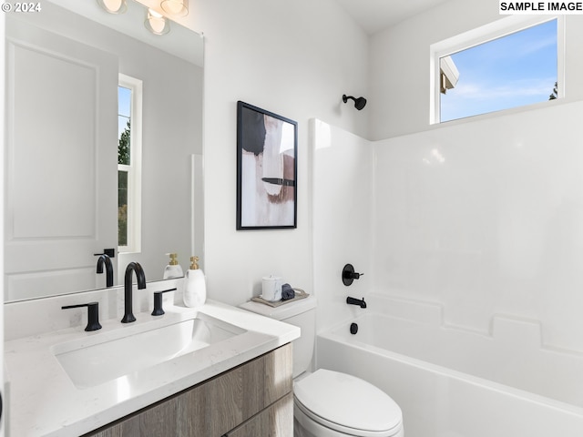 full bathroom featuring shower / tub combination, vanity, and toilet