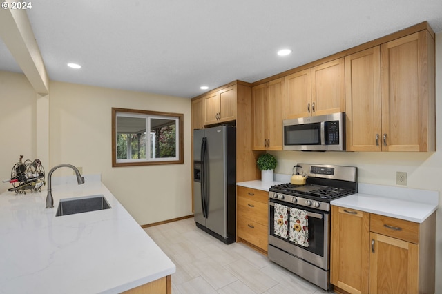 kitchen with sink and stainless steel appliances