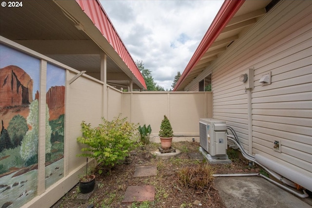 view of yard with central AC unit