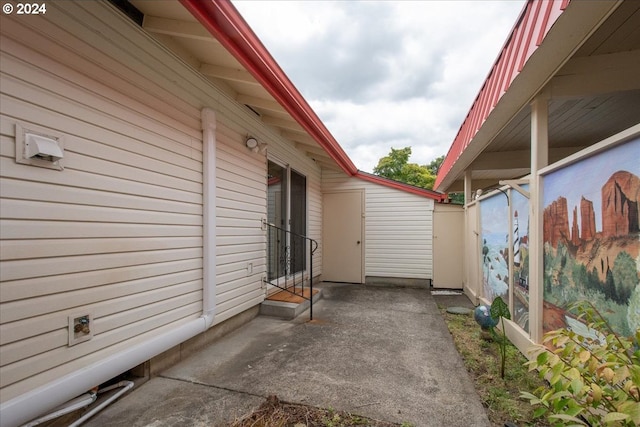 view of home's exterior with a patio area